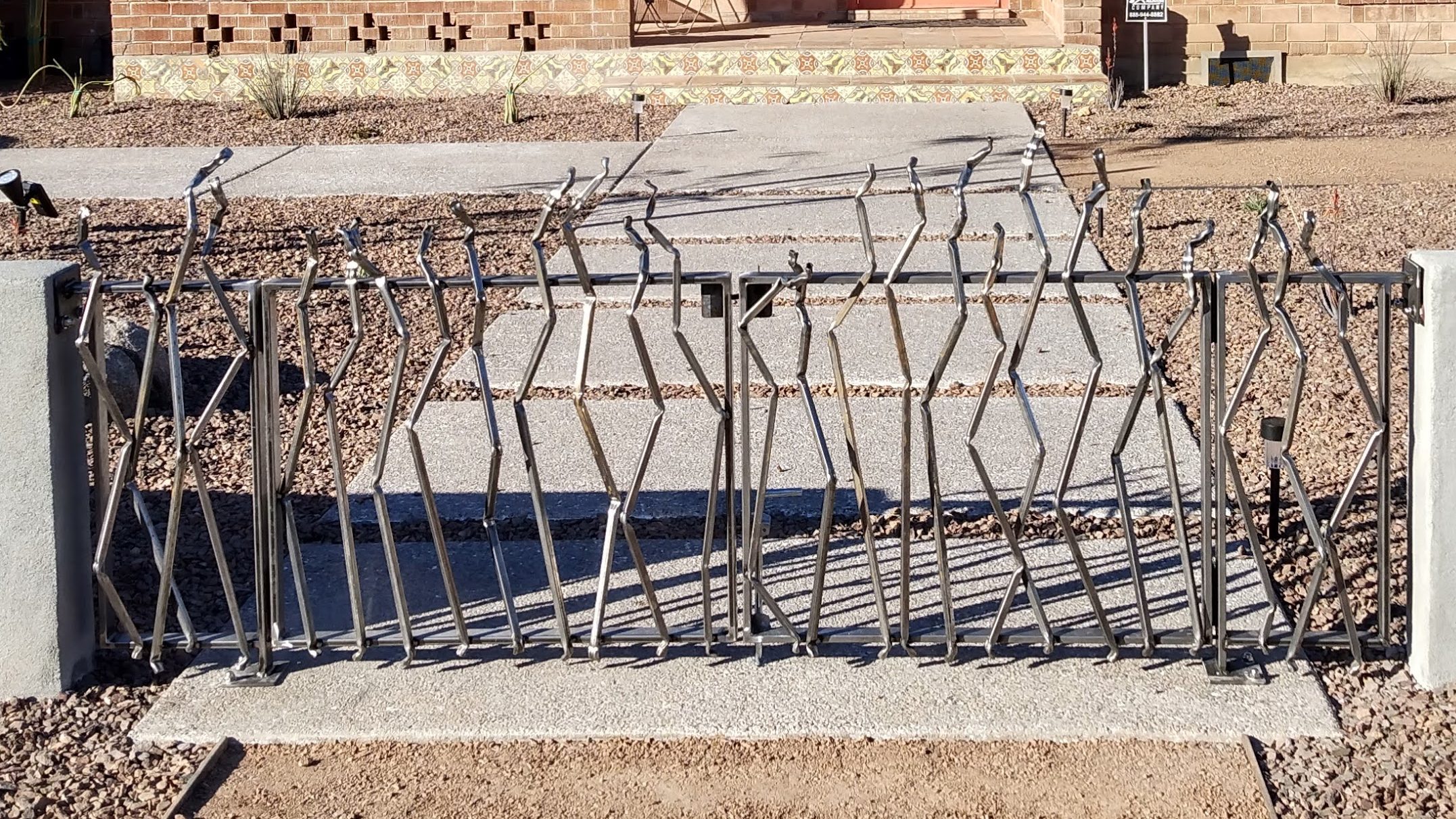 Artistic steel fence and gate detail with bent 1/2" square tubing in the Coronado, AZ neighborhood